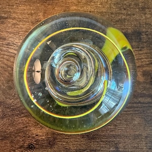Vintage Art Glass Paperweight – Hand Blown Clear Orb with Yellow & Orange Swirls – Retro Desk Decor – Mid Century Style