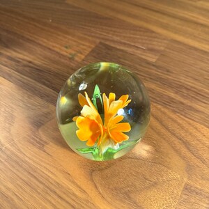 Vintage Art Glass Paperweight – 3” Clear Glass Sphere with Encased Orange Flower – Hand Blown Floral Decor – Retro Desk or Shelf Accent