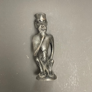 Wooden african statue / tribe hand carved  thinking man  stoking beard sitting