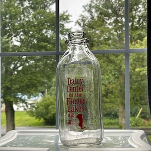 Finger lakes milk bottleOne quart milk glass bottle Dairy center of the
