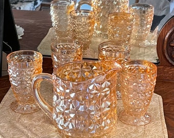 Depression glass juice cups and pitcher iridescent orange Carnival Glass