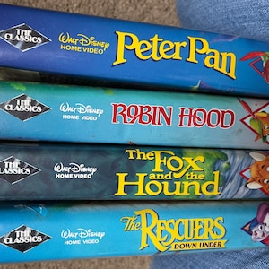 Black diamond VHS tapes peter pan / The foxand the hound / Robin hood / The rescuers