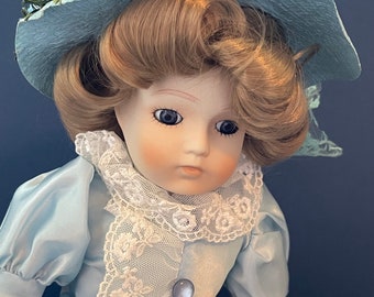 Blue dress  18” porcelain doll