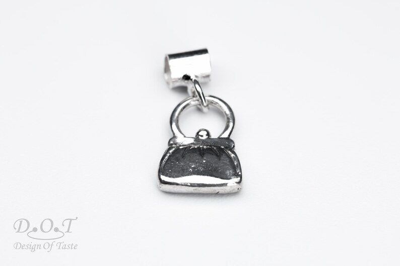 Sterling silver purse charm bracelet