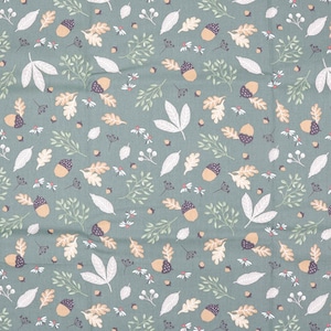 May include: A fabric with a repeating pattern of acorns, leaves, and small white flowers on a muted teal background. The leaves are in shades of white, tan, and green, creating a natural, autumnal theme.
