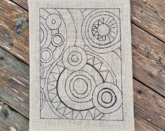 Rug hooking/punch needle pattern of Spiral Circles.