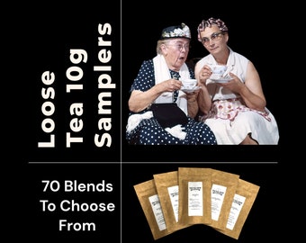 May include: Two women in vintage clothing are enjoying a cup of tea. The text on the left side of the image reads "Loose Tea 10g Samplers" and "70 Blends To Choose From". Below the women, there are six small brown paper bags with the text "The Tea Crop" printed on them.