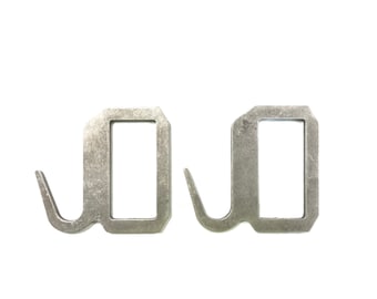 May include: Two silver metal hooks with a rectangular loop at the top. The hooks are designed for hanging items.
