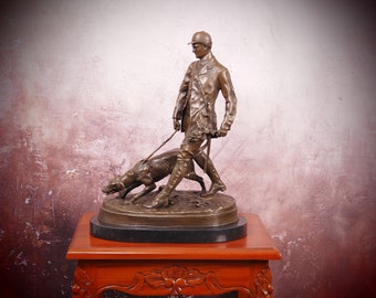 Elegant bronzen beeld van jager met jachthond - een tijdloos eerbetoon aan het gezelschap van de natuur