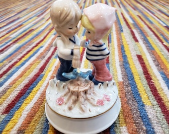 Vintage Ceramic Petite Fille aux Fleurs Musicbox My Instagram has the music tune