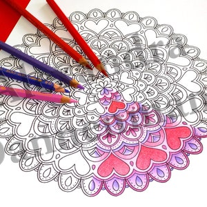 May include: A black and white mandala coloring page with a heart design. The mandala is partially colored in shades of pink and purple.