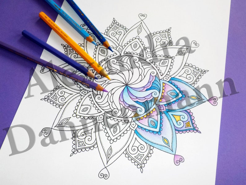 May include: A black and white mandala design with intricate details. The center of the mandala is colored in shades of blue, purple, and yellow.