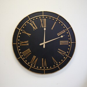 31&quot; Diameter Wall Clock with Black Wood Face, Gold Iron Rim and Gold Hand-Painted Numerals