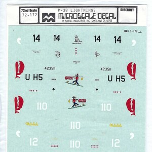 May include: A decal sheet for a 1/72 scale model of a P-38 Lightning aircraft. The sheet includes markings for the "U H5" aircraft, as well as other details like numbers, a small figure, and a lightning bolt.