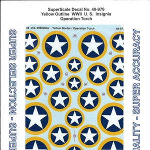 May include: A sheet of SuperScale decals featuring multiple U.S. insignia. The decals have a yellow border and a white star on a blue background. The text "48 U.S. INSIGNIA - Yellow Border / Operation Torch" is visible.