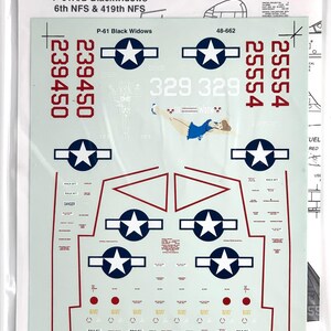 May include: A sheet of SuperScale decals for P-61A/B Blackwidows aircraft, featuring markings for the 6th NFS and 419th NFS. The decals include star insignias, numbers, and various warning labels. The sheet is in a clear plastic sleeve.
