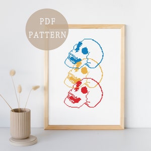 Stacked Skull Cross Stitch Pattern | Glitchcore Aesthetic Design | Neon Red Yellow and Blue