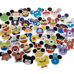 May include: A collection of colourful Disney character stickers featuring Mickey Mouse ears. The stickers feature characters such as Mickey Mouse, Minnie Mouse, Stitch, Buzz Lightyear, and more.