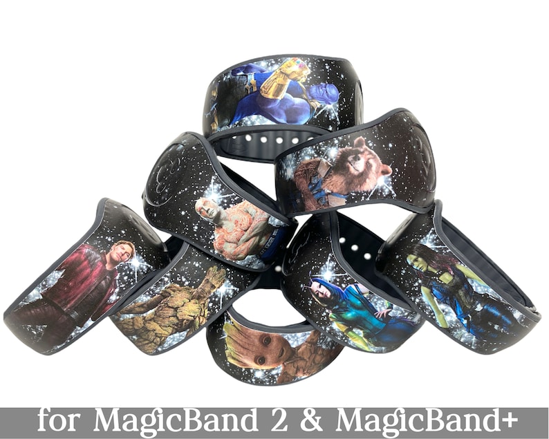 May include: Set of eight black MagicBand 2 and MagicBand+ wristbands with different Marvel character designs, including Star-Lord, Groot, Gamora, Rocket Raccoon, Thanos, and Nebula.