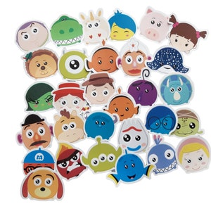 May include: A collection of 27 colourful cartoon character stickers featuring characters from popular Disney and Pixar films. The stickers are round and feature characters such as Buzz Lightyear, Woody, Dory, Nemo, Mike Wazowski, Sulley, and more.