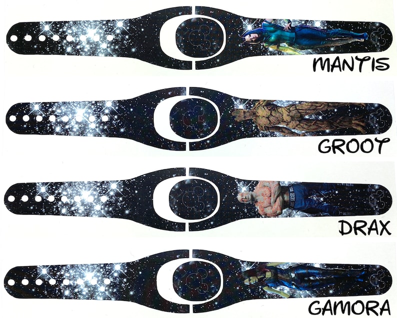 May include: Four different Disney MagicBand designs featuring characters from Guardians of the Galaxy. Each band has a black background with a white galaxy pattern and a character image. The characters are Mantis, Groot, Drax, and Gamora. The text "MANTYS", "GROOT", "DRAX", and "GAMORA" is printed below each character.