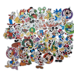 May include: A sheet of colourful Christmas-themed stickers featuring Mickey Mouse, Minnie Mouse, Donald Duck, Goofy, and other Disney characters. The stickers are ideal for decorating gifts, cards, and other items.