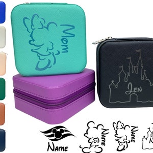 May include: A set of small, square, zipped jewellery boxes in various colours. The boxes feature different designs, including a Mickey Mouse silhouette, a castle, and a cloud with the word "Mom".