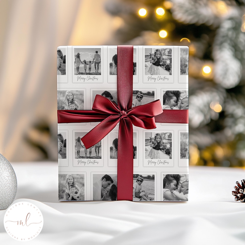 May include: A wrapped gift with a white background featuring black and white photos and the text "Merry Christmas." The gift is tied with a deep red satin ribbon and bow. The photos show families and children.