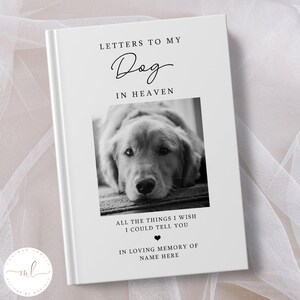 May include: A white book with the title "Letters to My Dog in Heaven". A black and white photo of a dog is on the cover. The text "All the things I wish I could tell you" is below the photo. A black heart is below the text. The text "In loving memory of Name Here" is below the heart.