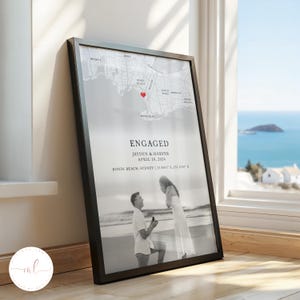May include: Framed black and white print featuring a map of Bondi Beach, Sydney, with a red heart marking a location. The print includes the text "ENGAGED" and the names "JAYDEN & HARPER" with the date "APRIL 10, 2024". A photo of a proposal is at the bottom.