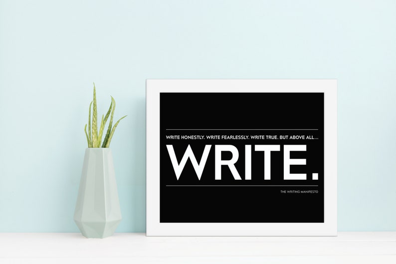 May include: A black and white printable wall art print with the text "WRITE HONESTLY. WRITE FEARLESSLY. WRITE TRUE. BUT ABOVE ALL... WRITE." and the text "THE WRITING MANIFESTO" at the bottom.