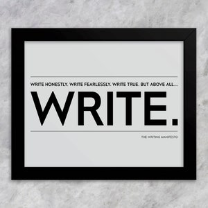May include: Black and white framed print with the text "WRITE HONESTLY. WRITE FEARLESSLY. WRITE TRUE. BUT ABOVE ALL... WRITE." and "THE WRITING MANIFESTO" at the bottom.