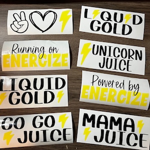 May include: Eight yellow and black vinyl decals with motivational phrases, including "Liquid Gold", "Unicorn Juice", "Powered by Energize", "Go Go Juice", and "Mama Juice".