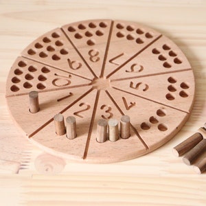 Wooden counting board with walnut pins