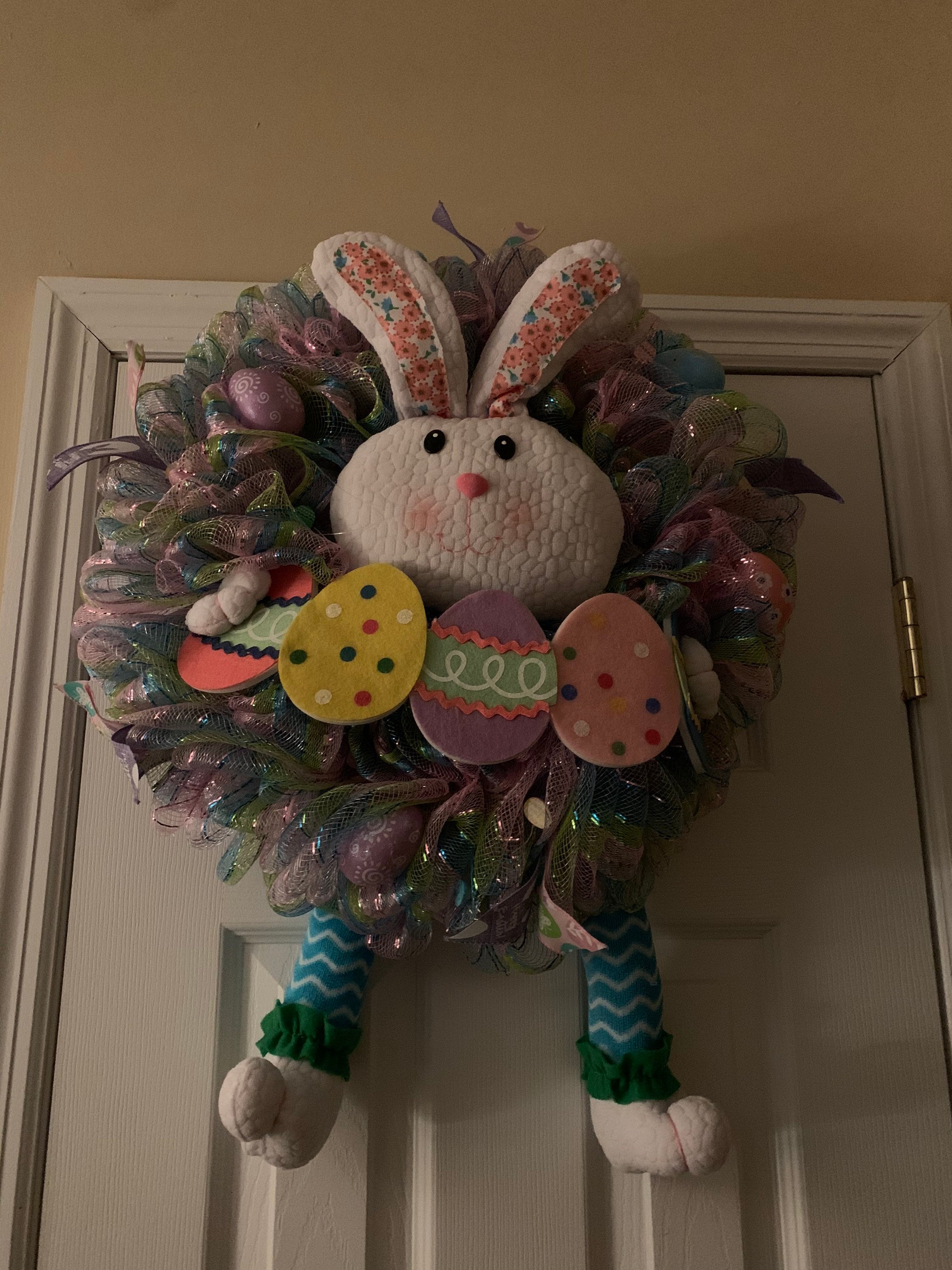 Easter Bunny holding Eggs Wreath
