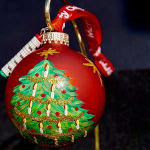 Personalized Hand-painted Music Inspired Glass Ornament. Christmas tree on a red hand blown glass ornament. Opera. Musical. Sheet music bead