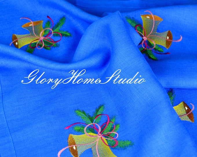 Natural linen blue tablecloth embroidered bells or candles