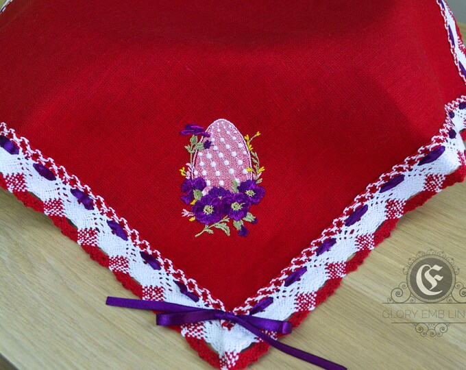 Napkin from red natural linen embroidered Easter egg with flowers