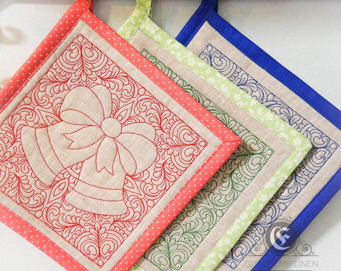 Set of 2 pot holders with Christmas Trapunto embroidery