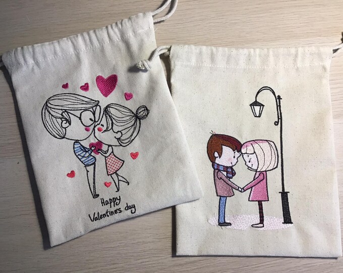 Pouch embroidered Love Is...