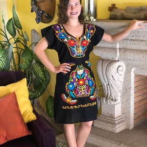 Mexican floral dress, embroidered Mexican dress, ethnic dress, embroidered dress with bright colors.