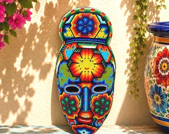 Huichol-pärlmask: Mexikansk folkkonstdekor