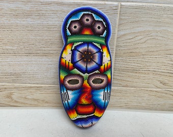 Huichol-pärlmask: Mexikansk folkkonstdekor