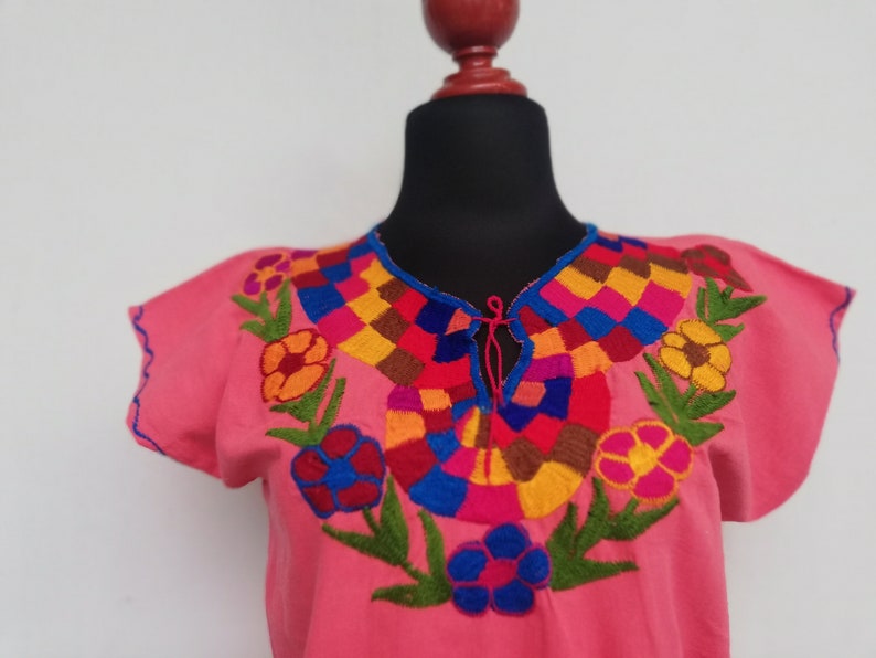 multicolored floral emboidery mexican huipil. Traditional mexican hand embroidered blouse ethnic blose