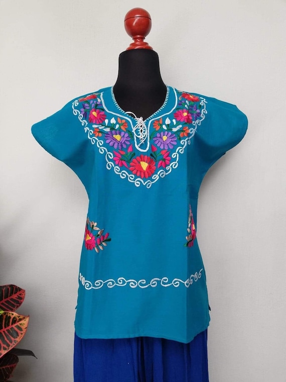 multicolored floral emboidery mexican huipil. Traditional mexican hand embroidered blouse ethnic blose