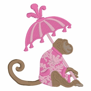 May include: An embroidered design of a monkey wearing a pink floral coat and holding a pink parasol. The monkey is brown with a long, curved tail. The parasol has pink and white stripes and tassels.