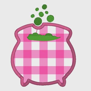 May include: A pink and white gingham cauldron with a pink outline. Green bubbles and a green leaf-like shape are rising from the cauldron. The design is likely for embroidery or a similar craft project.