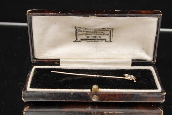 Antique 18ct Gold seed Pearl Pin in original box.