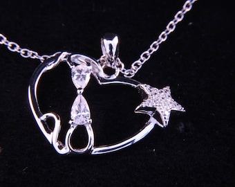 Silver Crystal Cat and Star Necklace. Vintage but looks unworn. Ideal Birthday or Christmas present. Beautiful gift in original box.