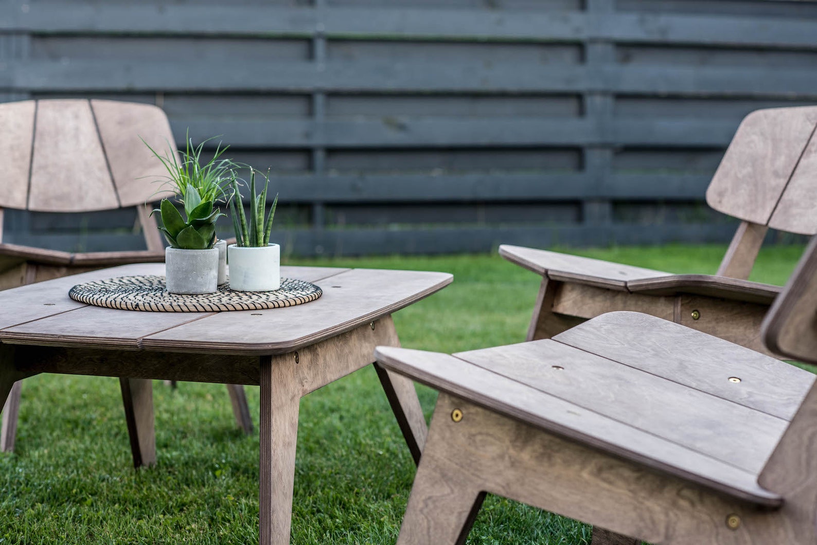Set of four lounge chairs and table